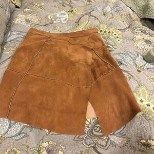 Italian designer Hand picked the suede. Flattering and buzzworthy